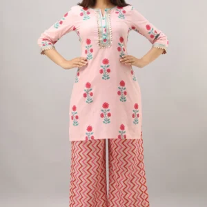 a woman in a pink short kameez with plazo dress